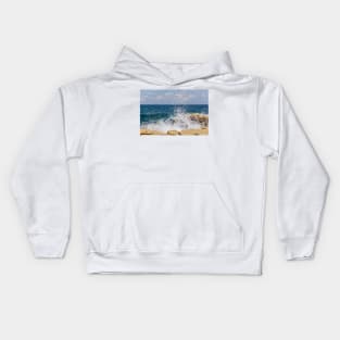 Wave breaks on rocks of the Sliema coast Kids Hoodie